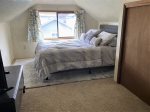 Loft bedroom with queen bed